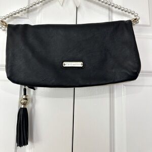 Steve Madden under arm faux leather black flap clutch with tan inner flap